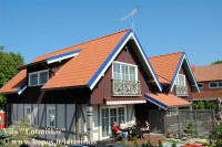 Das Ferienhaus “Lotmiškis” liegt ganz im Zentrum von Nidden